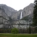 A waterfall cascading over mountains